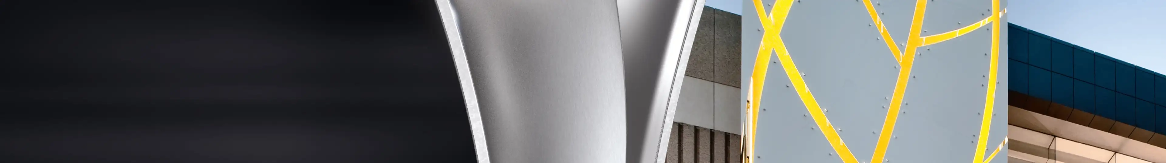 Ausschnitt eines Composings aus einer Aluminiumverbundplatte sowie einer Gebäudefassaade 